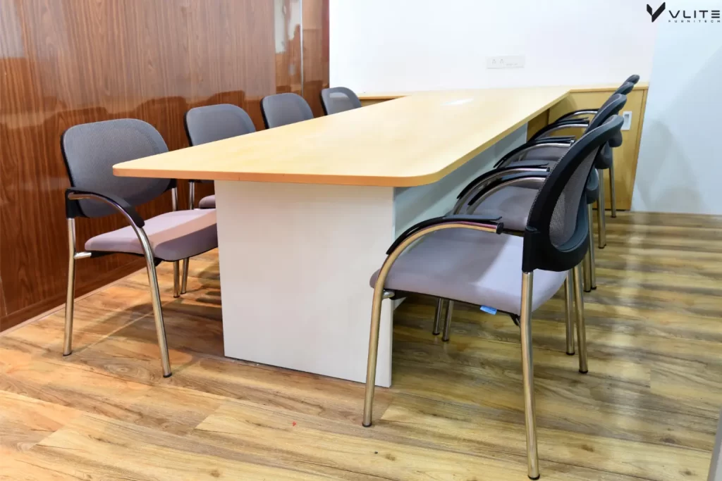 How to design an office interior to enhance collaboration using conference tables.